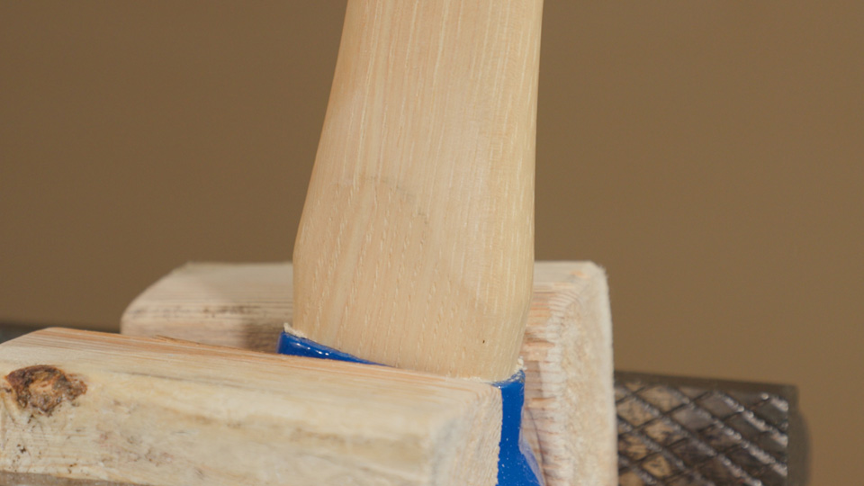 wood shavings on the edge of the hammer handle that mean it's far enough